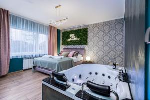 Łóżko lub łóżka w pokoju w obiekcie Exclusive Apartment Centrum 2