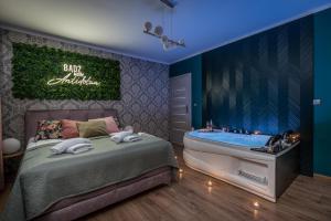 Łóżko lub łóżka w pokoju w obiekcie Exclusive Apartment Centrum 2