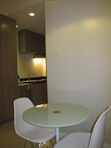 Kuchyň nebo kuchyňský kout v ubytování Zerenity Hotel & Suites