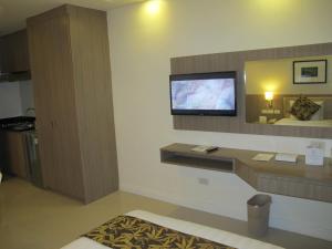 Kuchyň nebo kuchyňský kout v ubytování Zerenity Hotel & Suites