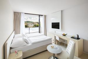 Letto o letti in una camera di Hotel Thermal
