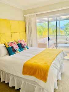 Ένα ή περισσότερα κρεβάτια σε δωμάτιο στο Damview Holiday Home