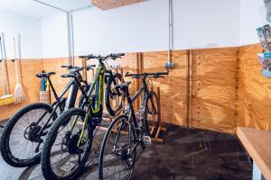 two bikes parked next to each other in a room at Landhaus Valfontana in Vandans