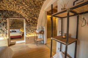 Postel nebo postele na pokoji v ubytování Bazzario B&B