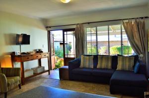 Et opholdsområde på Dullstroom Artist Cottages