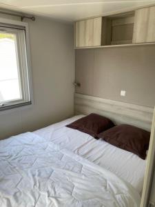 Posteľ alebo postele v izbe v ubytovaní Mobil Home