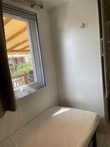 Posteľ alebo postele v izbe v ubytovaní Mobil Home