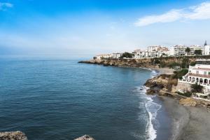 a beach with a view of the ocean at Marissal by Dorobe Hotels in Nerja