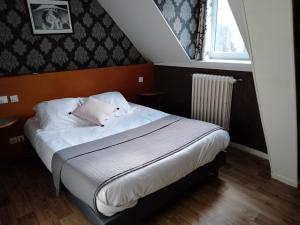 Postel nebo postele na pokoji v ubytování Hotel Central Anzac
