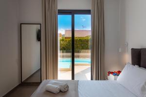 En eller flere senge i et værelse på Gelso Bianco Boutique Apartments + 75 billeder