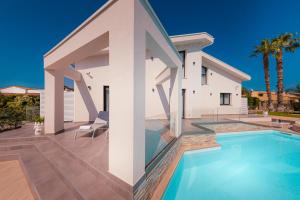 Swimmingpoolen hos eller tæt på Gelso Bianco Boutique Apartments