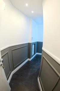 an empty room with a door and a window at WE LOVE ROMA Guest House in Rome