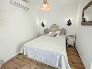 Posteľ alebo postele v izbe v ubytovaní La Terraza de Salomon ApartamentosMalagaManagement