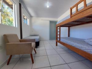 En eller flere køjesenge i et værelse på Hostel Moçambique