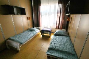 Postel nebo postele na pokoji v ubytování Garni