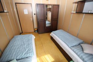 Postel nebo postele na pokoji v ubytování Garni