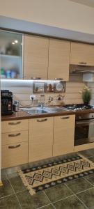 Η κουζίνα ή μικρή κουζίνα στο Emma apartament