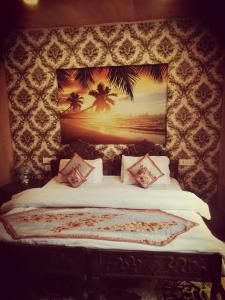 Llit o llits en una habitació de House Boat Hardy Palace