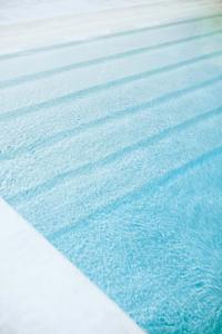 a close up of a swimming pool at CALIXTA Hotel in Playa del Carmen
