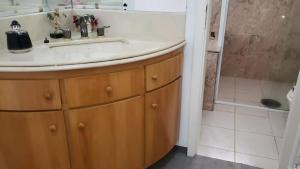 Koupelna v ubytování ***Apartamento Pitangueiras Fantástico***