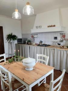 Kuchyň nebo kuchyňský kout v ubytování Cortona's Rooftop Nest