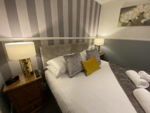 Llit o llits en una habitació de Abingdon House