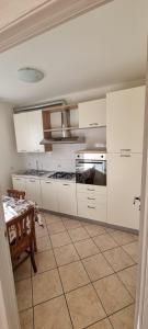 Kuchyňa alebo kuchynka v ubytovaní Casa la Vigna