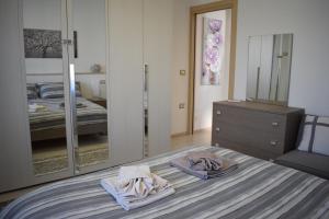 Postel nebo postele na pokoji v ubytování Vacanze mare e montagna