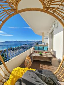 a living room with a view of the ocean at Western Cannes - Panoramic View in Cannes