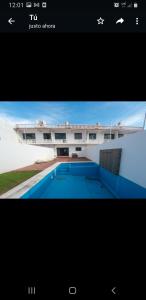 uma imagem de um edifício com piscina em ACAPULCO DIAMANTE NUEVA E INCREIBLE VILLA CON ALBERCA PROPIA em Acapulco