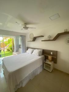 Llit o llits en una habitació de GUARAJUBA Condomínio PARAÍSO DOS CORAIS BEACH RESORT 132