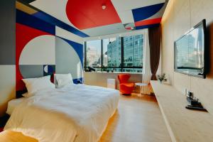Un pat sau paturi într-o cameră la 7Shang