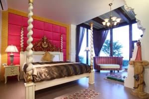 Postel nebo postele na pokoji v ubytování Hao Wang Jiao House