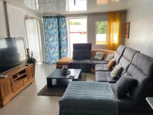 Posezení v ubytování Escapade dans l'Est , chambre confort avec piscine