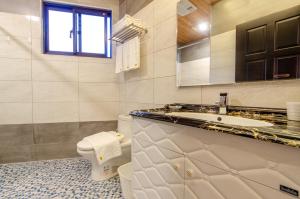 Fotografie z fotogalerie ubytování WanTon B&B v destinaci Dongshan + 37 fotografií