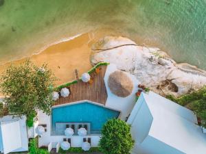 an overhead view of a building on a beach at Rocky's Boutique Resort - Veranda Collection Samui in Lamai
