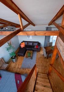 an overhead view of a living room with a couch at Little Forest Farm in Magaliesburg