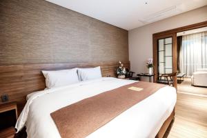 Intrada Icheon Hotel客房内的一张或多张床位