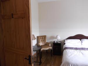 Cama o camas de una habitación en Ashley Lodge Bed & Breakfast
