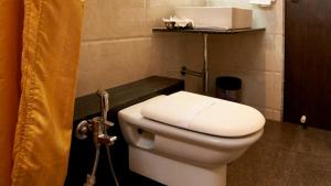 Koupelna v ubytování HOTEL SAI NISARG