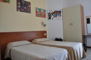 Postel nebo postele na pokoji v ubytování Nido Verde