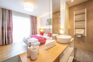 Ένα ή περισσότερα κρεβάτια σε δωμάτιο στο Hotel Loy