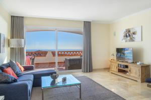 Μια τηλεόραση ή/και κέντρο ψυχαγωγίας στο Astonishing view modern apartment