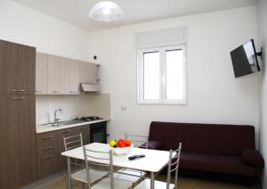 Kuchyň nebo kuchyňský kout v ubytování Don Nicola Residence