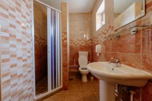 Koupelna v ubytování Hotel Zlatni bor