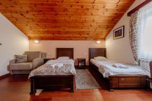 Postel nebo postele na pokoji v ubytování Hotel Zlatni bor