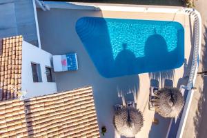 an overhead view of a swimming pool on a building at LA MAR - Managed by Almarina in Benissa