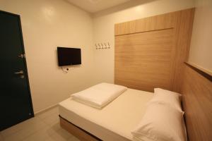Postel nebo postele na pokoji v ubytování Shamrock Guest House