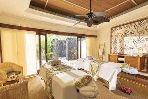 Postel nebo postele na pokoji v ubytování Maritim Resort & Spa Mauritius