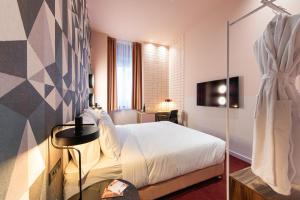 Posteľ alebo postele v izbe v ubytovaní Stories Boutique Hotel